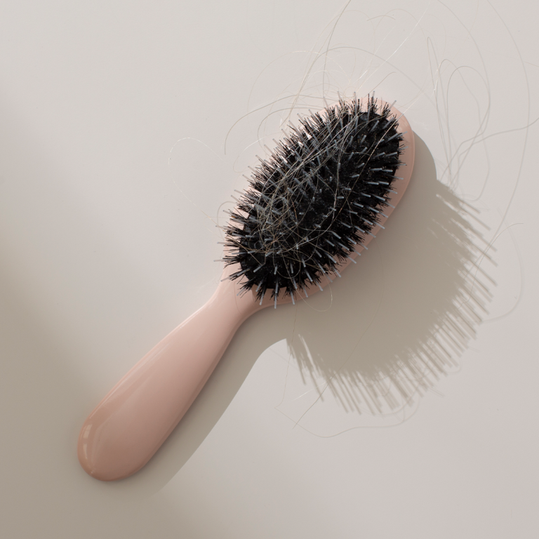 Hairbrush for grooming and styling hair.