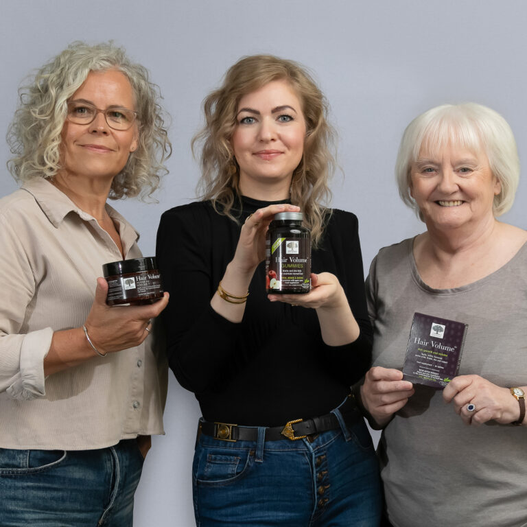 Review panel women holding different Hair Volume products.