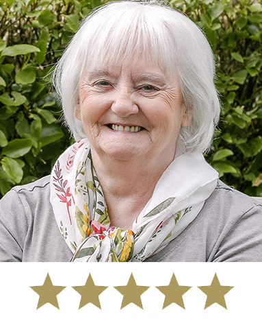 Hair Volume™ 12 Woman smiling with five stars displayed underneath.