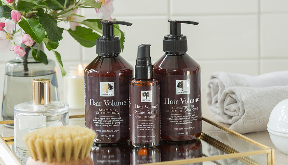 Our hair care treatment products in a bathroom setting