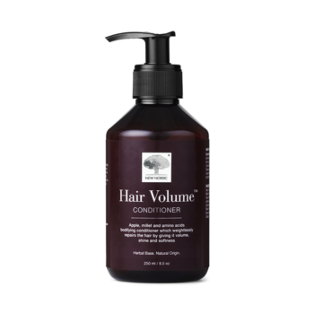 New Nordic Hair Volume™ Conditioner repairs and nourishes hair with apple, millet, and rice protein, adding volume, shine, and softness. Image of product.