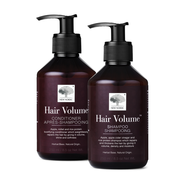 i_webpackshot_hairvolume_shampoo_conditioner_kombi_1._1. New Nordic Hair Volume™ Shampoo & Conditioner with apple extract and amino acids to help maintain fuller-looking, shiny hair.