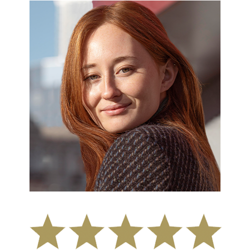 Hair Volume™ Gummies 11 Woman smiling with five stars displayed underneath.