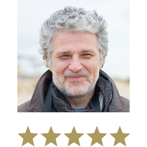 Hair Volume™ Shampoo 13 Man smiling with five stars beneath