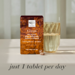 The Chaga™ package displayed with a glass of water and a tablet with text Just 1 tablet per day.