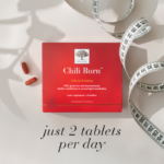 The red Chili Burn™ package displayed with a measuring tape and text Just 2 tablet per day.