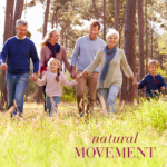 Happy family of all ages enjoying nature together with text Natural Movement.