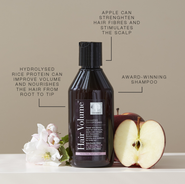 Hair Volume Shampoo bottle with apple and claims