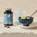 Magic Magnesium™ Citrate Gummies displayed in a cozy breakfast setting with text Just 2 gummies per day.
