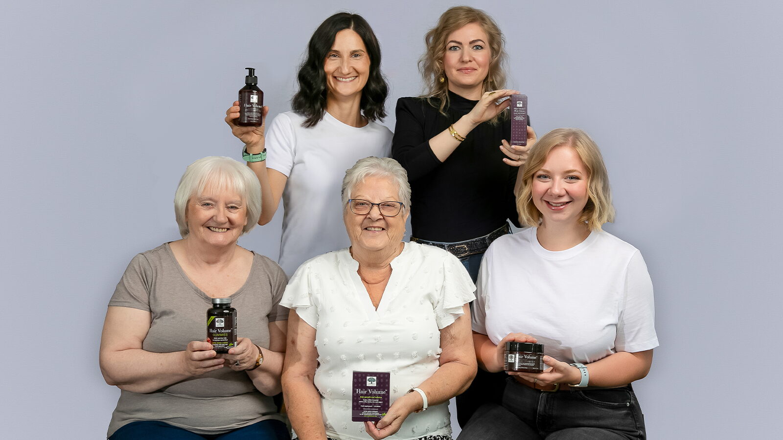 Group of 5 women holding hair volume products