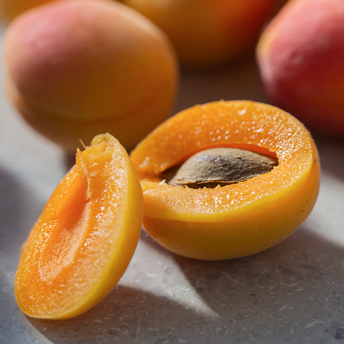 Fresh abricots, some cut open
