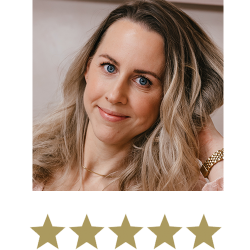 Natural Magic™ Amazing Eye Cream 12 Woman smiling with five stars displayed underneath.