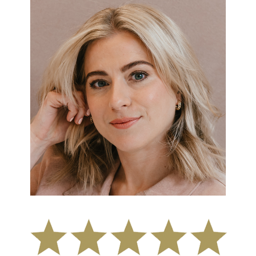 Natural Magic™ Anti-ageing Cream 14 Woman smiling with five stars displayed underneath.