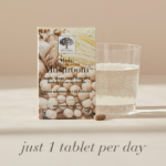 Multi Mushroom™ package displayed with a glass of water and the text Just 1 tablet per day.