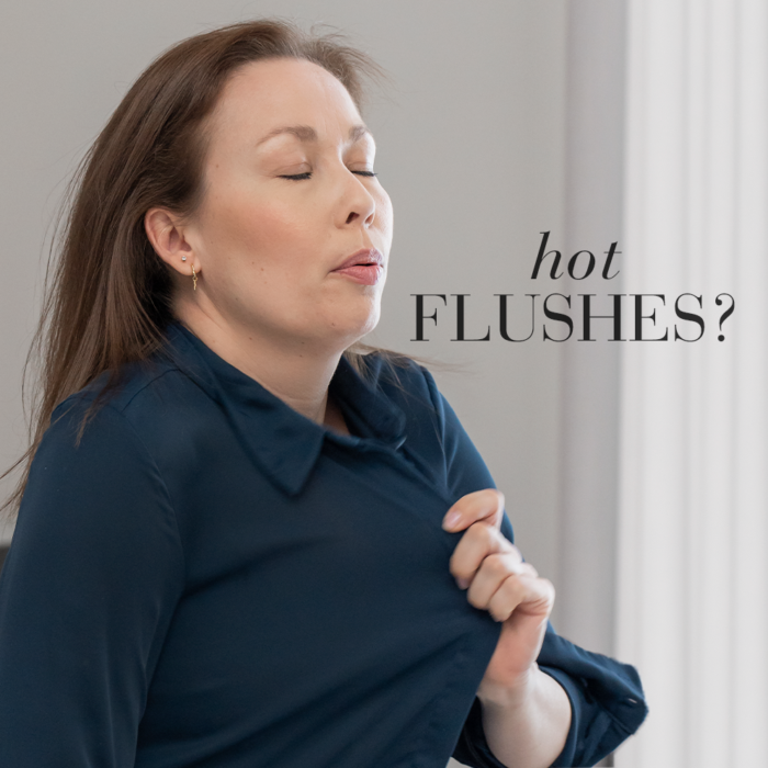 Lady experiencing hot flushes.