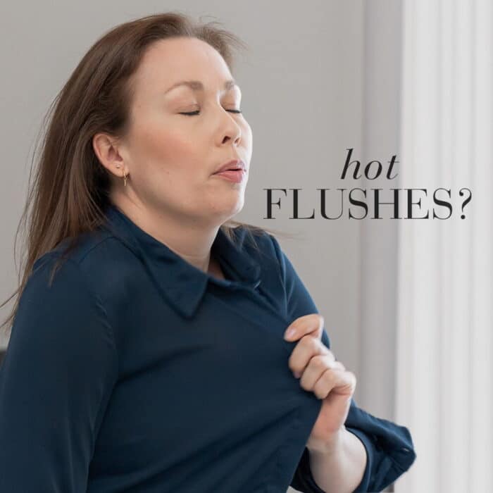 Lady experiencing hot flushes.