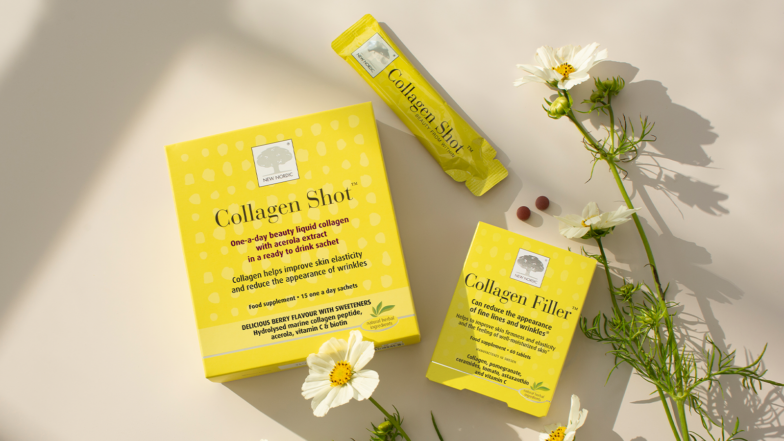Hyaluronic Shot™ 14 Collagen Shot™ and Collagen Filler™ surrounded by flowers.