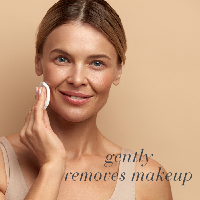 Woman removing makeup with text Gently removes makeup