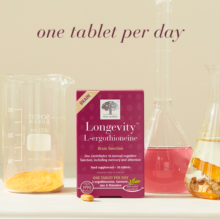 Longevity L-ergothioneine Supplement box with glass of water