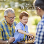 Family Playing chess in a sunny park.