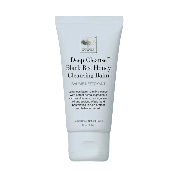 The New Nordic Deep Cleanse⢠Black Bee Honey Cleansing Balm helps maintain balanced skin with honey, aloe vera and moringa.