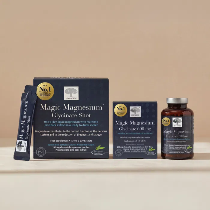 Range of Magic Magnesium™ products displayed in blue packaging on a neutral background.