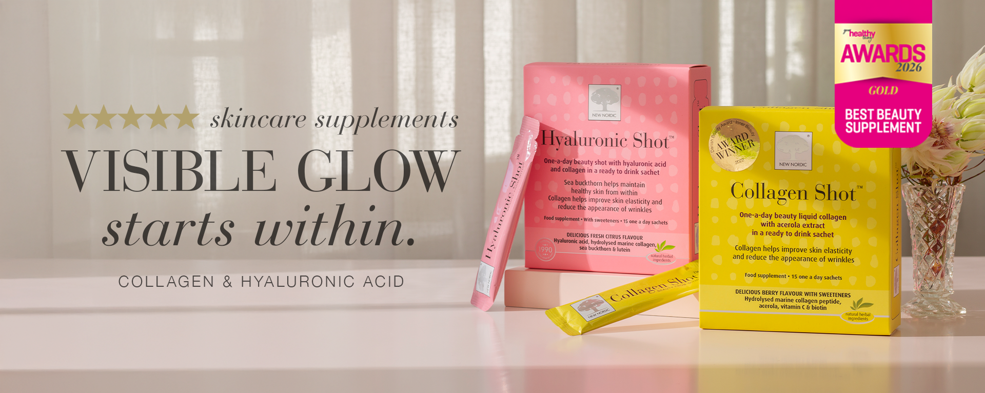 Image of New Nordic skincare supplements, including Collagen Shot and Hyaluronic Shot, with the text "Visible glow starts within. Collagen and Hyaluronic Acid."
