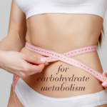 Close-up of a woman measuring her waist with a tape measure, with text referencing carbohydrate metabolism.