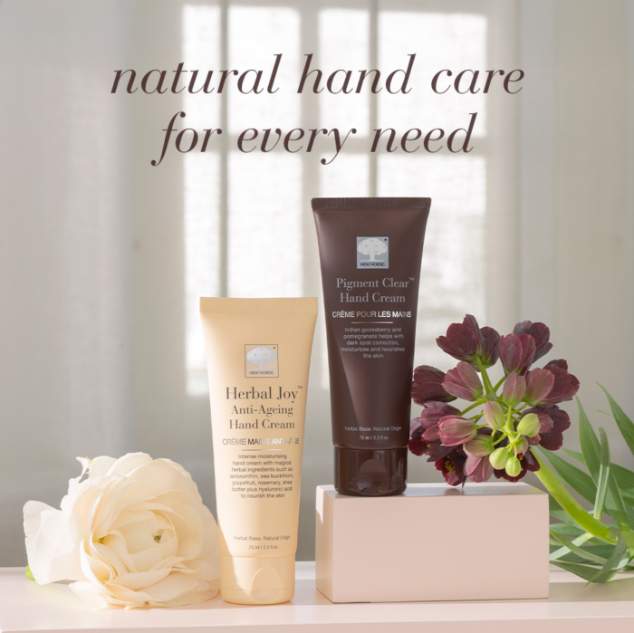 Pigment Clear and Herbal Joy hand creams displayed with flowers and text Natural hand care for every need.