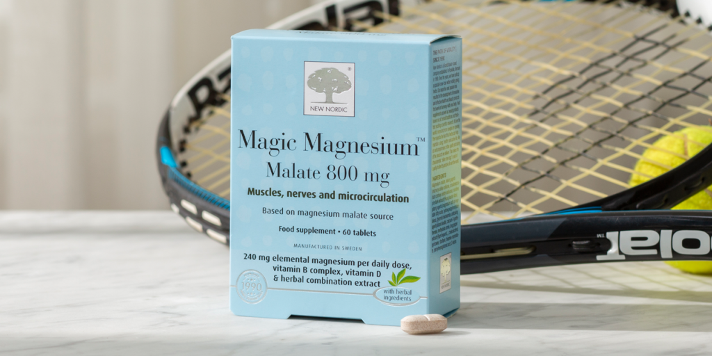 Magic Magnesium Malate Box in front of a tennis racket and ball