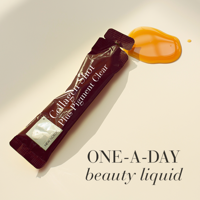 Collagen Shot Plus Pigment Clear sachet with liquid, shown as one-a-day beauty supplement.