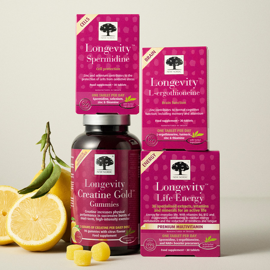 Four Longevity products stacked on top of each other with lemons in the background
