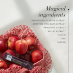 Magical ingredients with an image of hair volume shot sachet on top of a bag of red apples