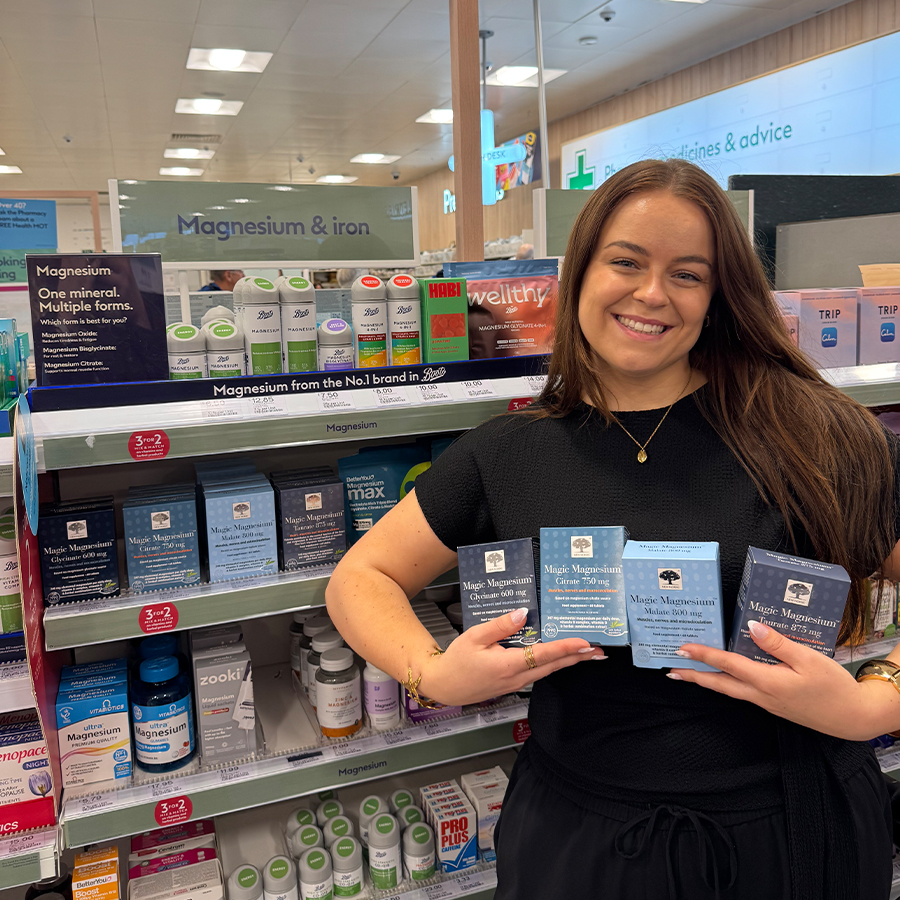 Woman holding magnesium products in store