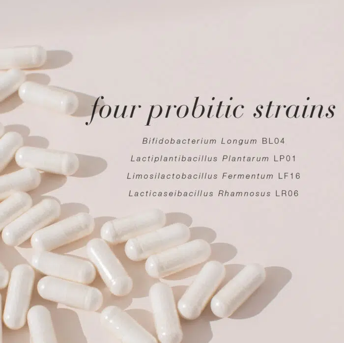 Four probiotic strains highlighted alongside white capsules.