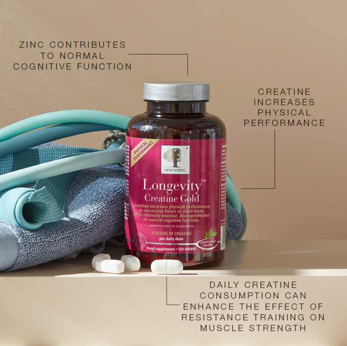 New Nordic Longevity™ Creatine Gold with tablets and training equipment, supporting physical performance.