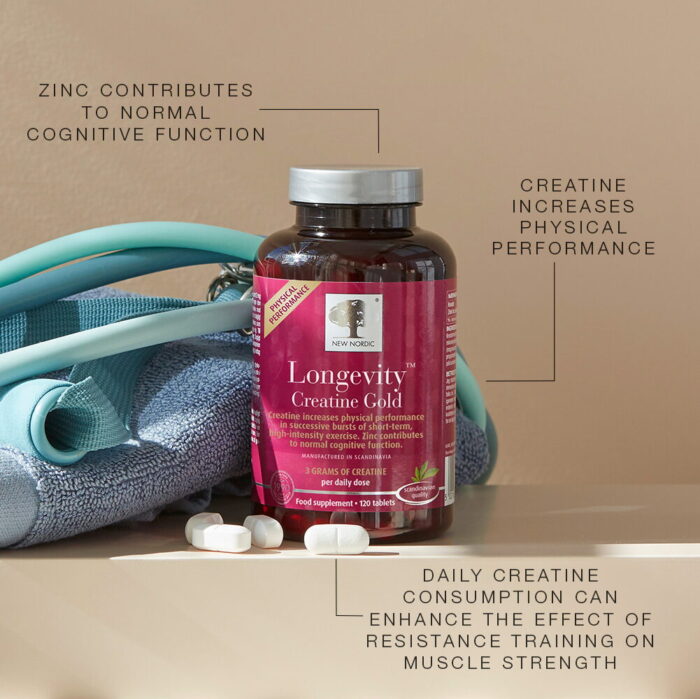 New Nordic Longevity™ Creatine Gold with tablets and training equipment, supporting physical performance.