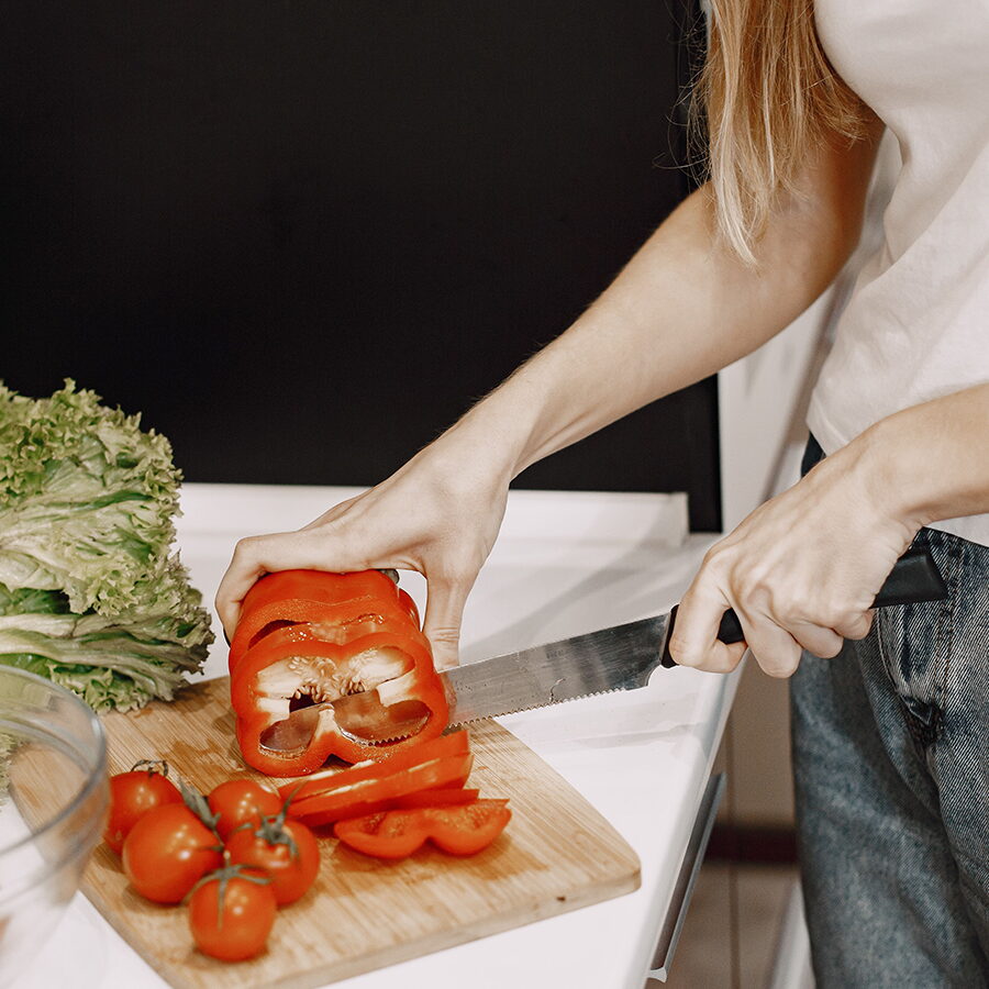 Slicing vegetables on a cutting board